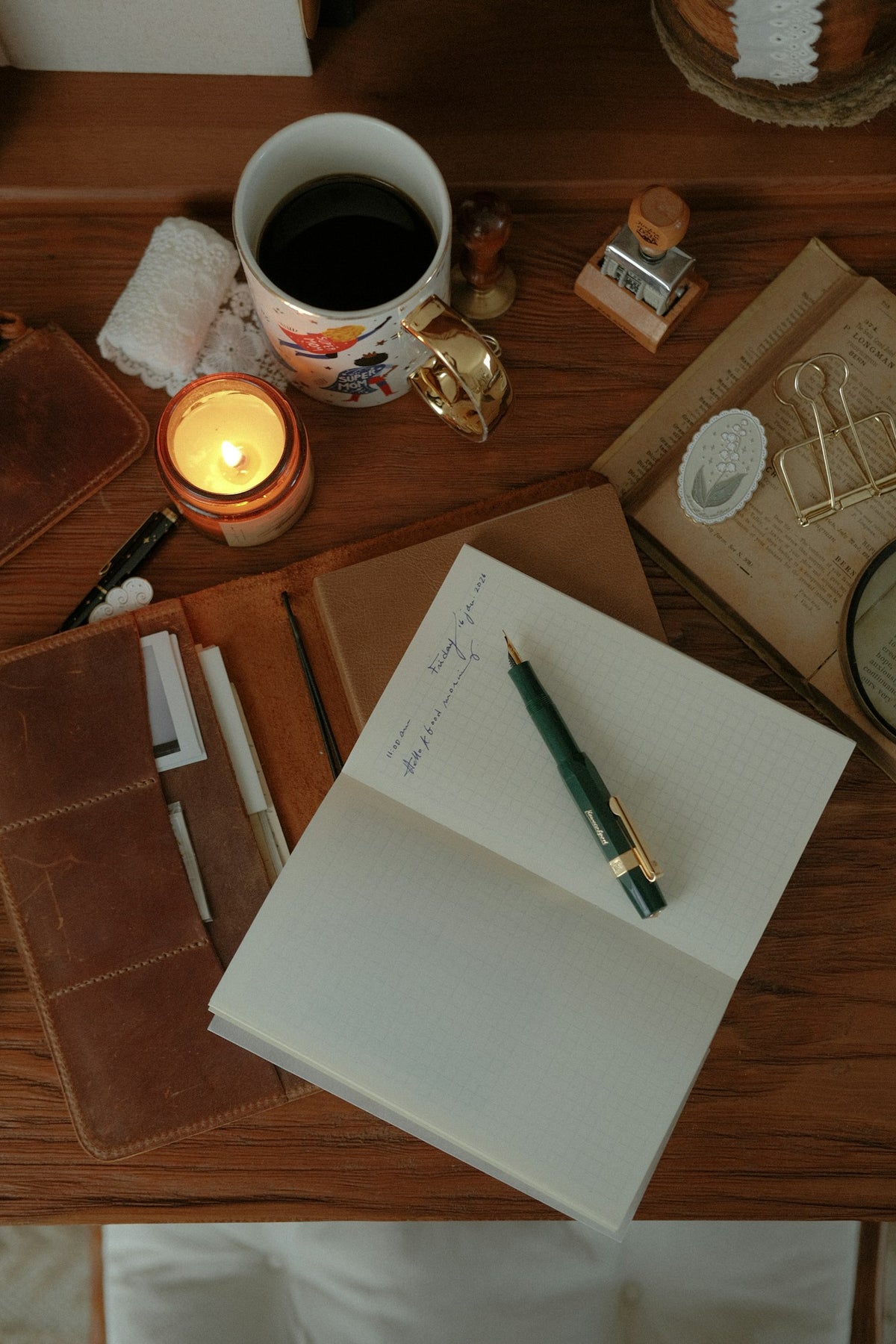 A candlelit journal and coffee — the golden hour ritual